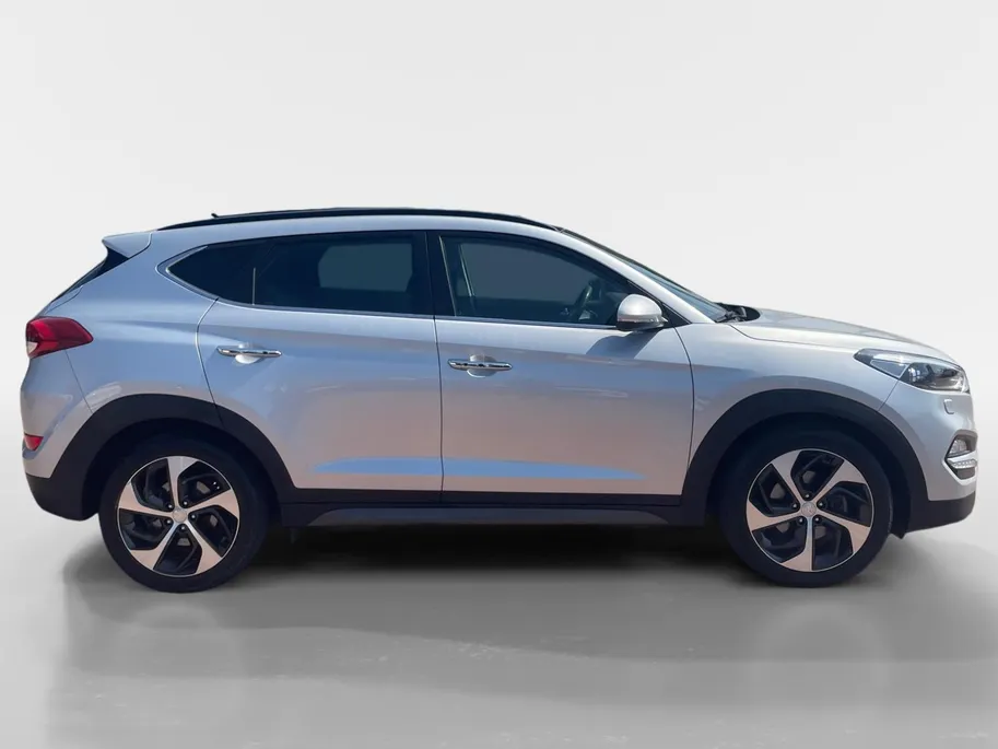 Hyundai Tucson 1.6 T-GDi Premium 4WD | STOEL VERWARMING | SCHUIFKANTELDAK | CAMERA | NAVIGATIE | ELEKTRISCHE STOEL |