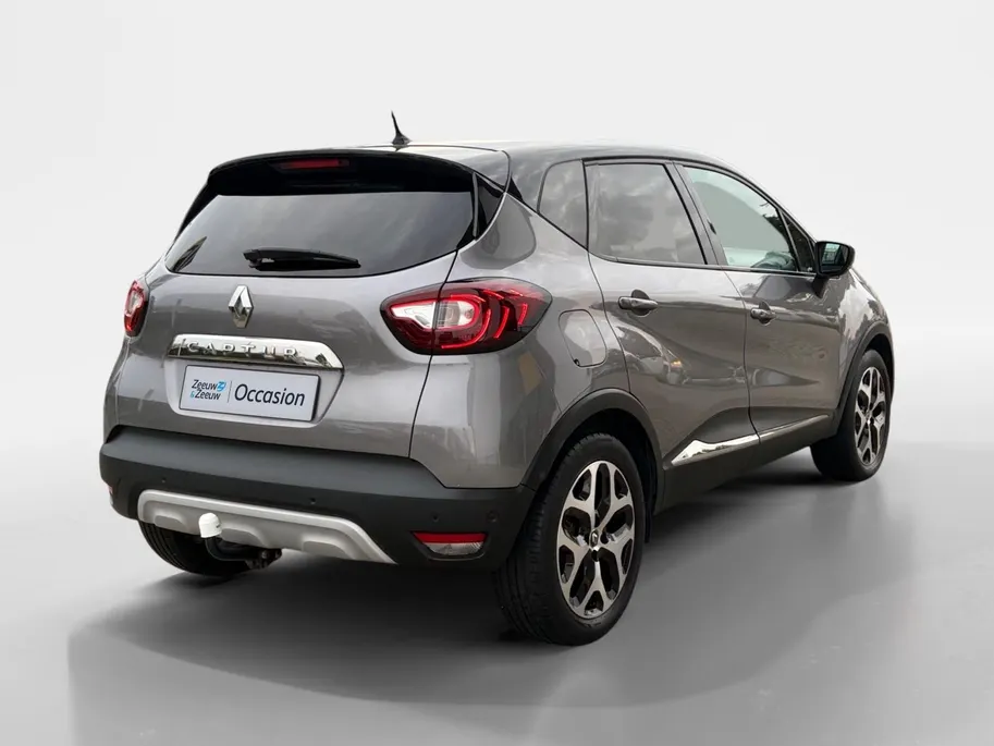 Renault Captur 150PK TCe Intens Automaat | 1ste Eigenaar | Trekhaak | 1200kg Trekgewicht | Cruise Control | Climate Control | Navigatie | Camera | Parkeersensoren | Licht & Regen Sensor | Armsteun |