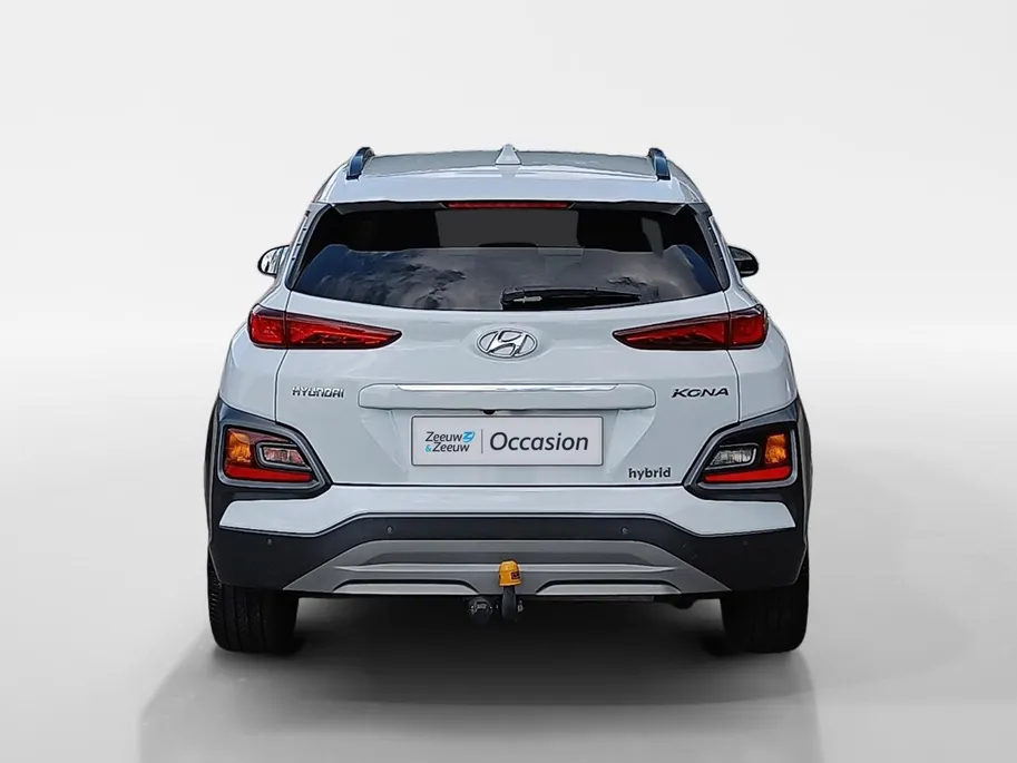 Hyundai Kona 1.6 GDI HEV Premium | Trekhaak | Apple Carplay/Android Auto | Adaptive cruise control | Dodenhoek herkenning | Leren bekleding
