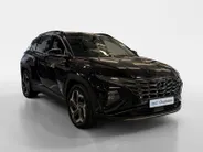 Hyundai Tucson 1.6 T-GDI PHEV Premium Sky 4WD | 66km WLTP elektrisch | Navigatie | Adaptive cruise control | Trekhaak | Apple Carplay & Android Auto | Dode hoek detectie | Draadloze telefoonlader |