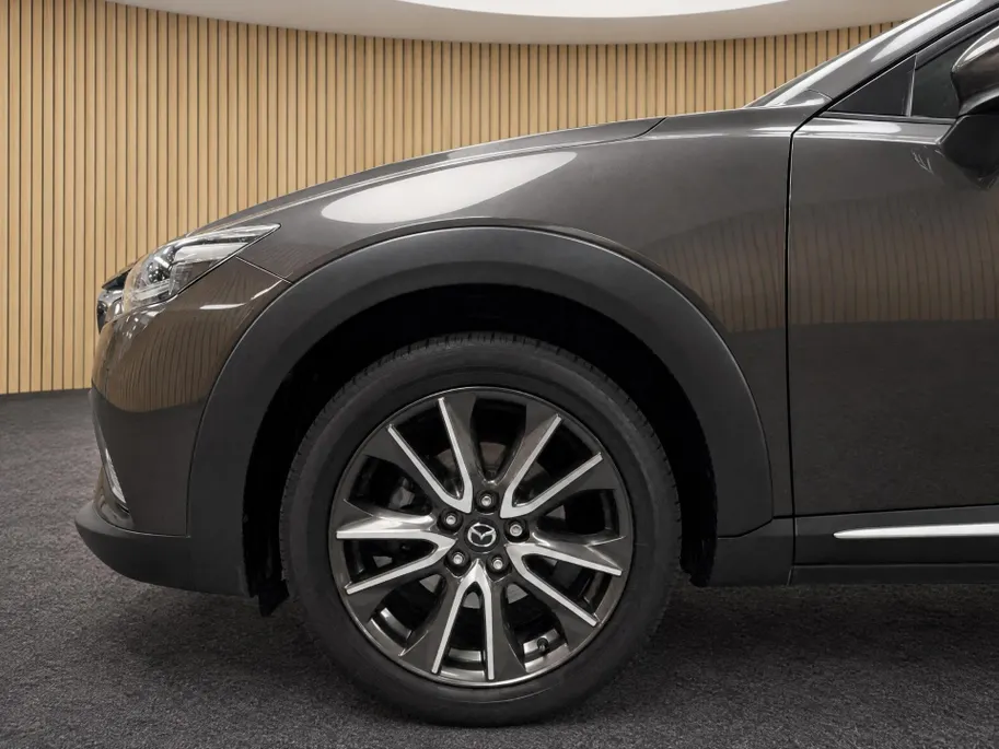 Mazda CX-3 2.0 SkyActiv-G 120 GT-M Trekhaak | HUD | Stoelverwarming | Navigatie | Lichtmetaal | Dodehoek detectie |