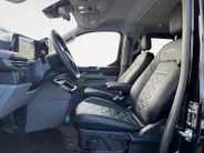 Ford Transit Custom 320 2.5 PHEV L2H1 Black Platinum DC EXCL. BTW &  | 233 pk Automaat | Lederen bekleding | Navigatie | Treeplanken | LM velgen 17' zwart | 360 graden camera | Dubbele schuifdeur