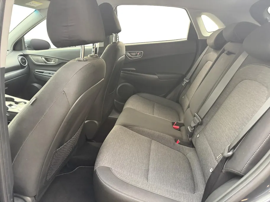 Hyundai Kona EV Fashion 64 kWh | Zeer nette auto | 97,6 % SOH | Navigatie | Head-up display | Achteruitrijcamera | Hoge zit |
