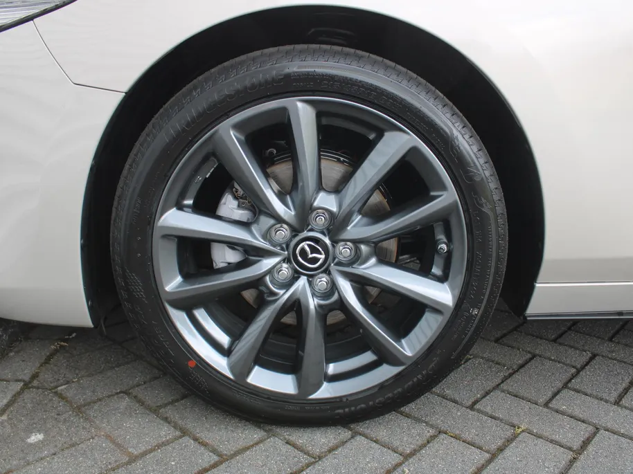 Mazda 3 2.5 e-SkyActiv-G M Hybrid 140 Exclusive-line | Nieuw | Stuur-/stoelverwarming | 360 Camera | Dodehoek detectie | HUD | Bose audio | 18' LM | LED |