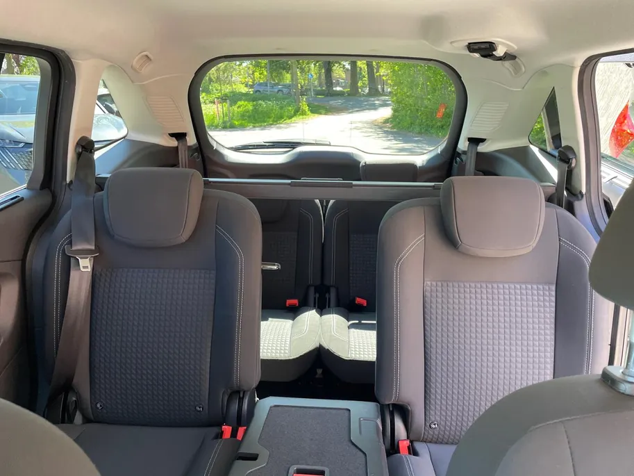 Ford Grand C-Max 1.0 Titanium 7Pers. | Navigatie | Voorruitverwarming | Stoelverwarming | Privacy Glass | Cruise Control | 17|  Velgen | Parkeersensoren voor en achter | Parkeerassistent | Zonneschermen