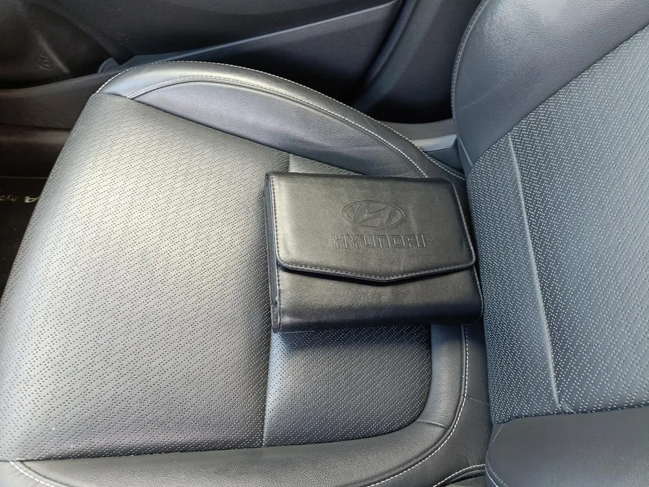 Hyundai Kona 1.6 GDI HEV Premium | Trekhaak | Apple Carplay/Android Auto | Adaptive cruise control | Dodenhoek herkenning | Leren bekleding
