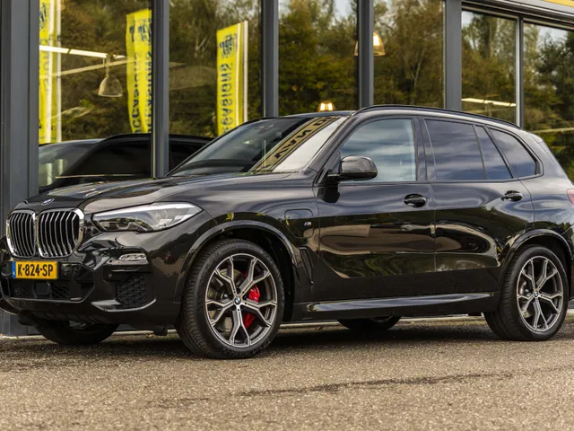 BMW X5 xDrive45e High Executive | NL geleverd | 1e Eigenaar | Achteras besturing |
