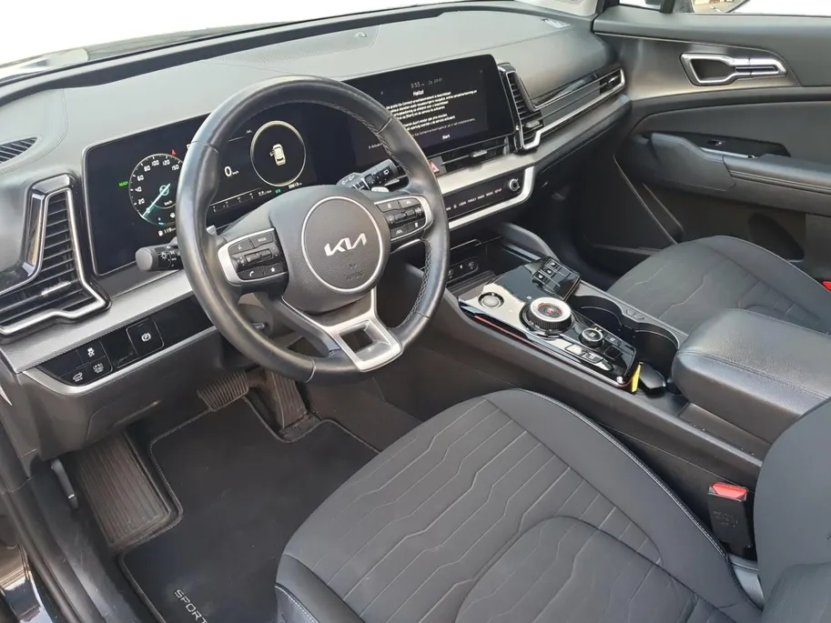 Kia Sportage 1.6 T-GDi Hybrid DynamicPlusLine | Stoel en stuurverwarming | Panorama schuifdak | Elektrisch bedienbare voorstoelen | Navigatie | Dodehoek detectie | Getinte ramen achter |