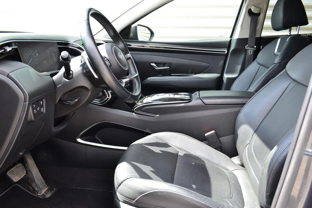 Hyundai Tucson 1.6 HEV PREMIUM|LEER|NAVI|1650KG TREKGEWICHT
