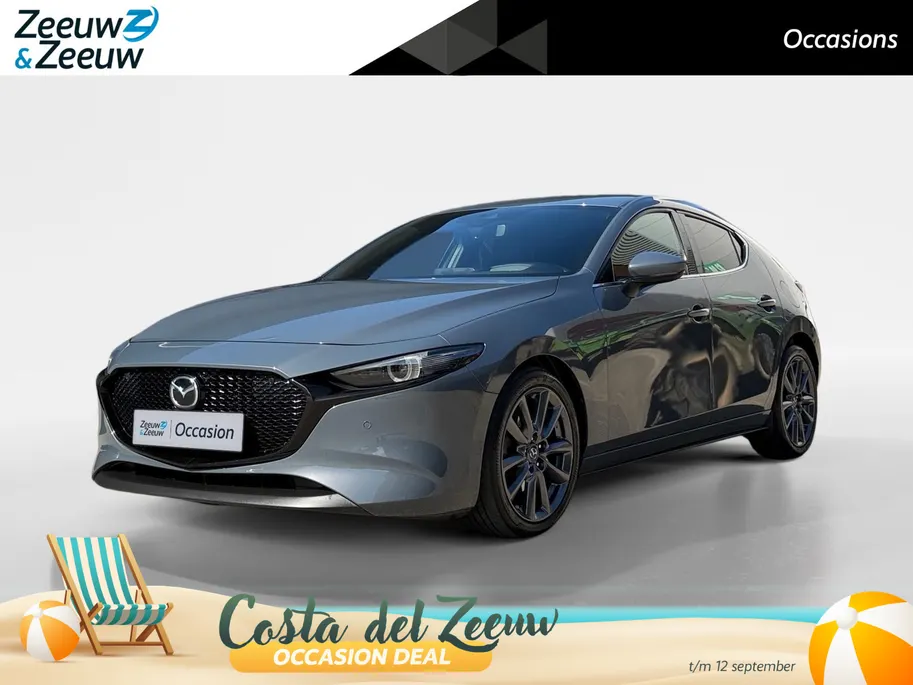Mazda 3 2.0 e-SkyActiv-G M Hybrid 122 Comfort met Bose | Apple Carplay / Android Auto | Navigatiesysteem | Licht + Regensensor | Elektrisch Verstelbare Bestuurderstoel  | Stoel + Stuurverwarming | Parkeersensoren Voor + Achter | Camera Achter | 18'Lichtmetalen ve