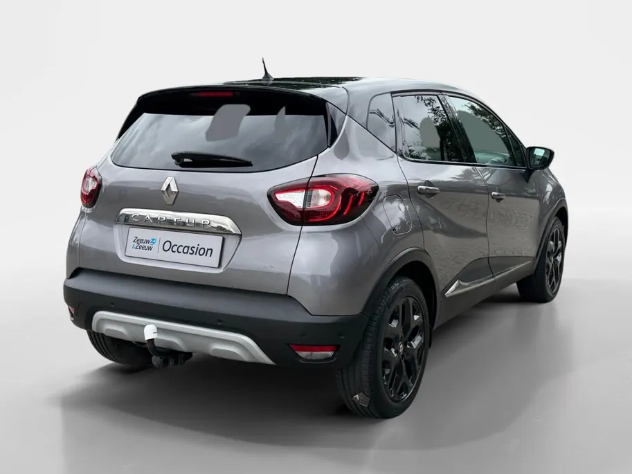 Renault Captur 120PK TCe Intens Automaat | Trekhaak | Navi | LM Velgen Hoogglans Zwart | Camera | Parkeersensoren | Full LED | Climate Control | Cruise Control | Keyless Entry | Elektrische Ramen & Spiegels | Licht & Regen Sensor |