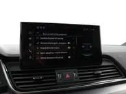 Audi Q5 Sportback 50 TFSIe 299pk S edition Competition · Camera · Inklap. Trekhaak · Matrix LED · Dodehoeksensor · Stuur- & Stoelverwarming · Elektrische stoelverstelling · Apple/Android Car Play · Garantie t/m 24-06-2030 of 100.000km