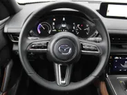 Mazda MX-30 e-SkyActiv R-EV 170 Advantage Industrial | Stoelverwarming | HUD | Dodehoek detectie | Elek. stoelverstelling | LED | 18' LM | Camera |