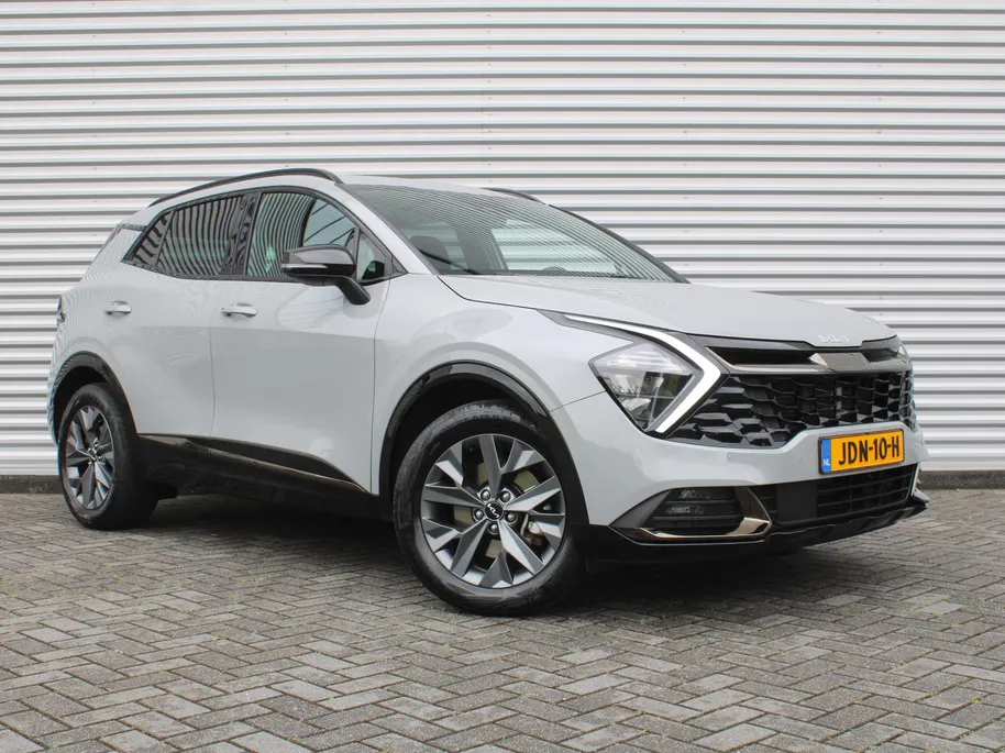 Kia Sportage 1.6 T-GDi Hybrid Dark Edition | Stuur-/stoelverwarming v+a | Camera | Elek. stoelverstelling | 18' LM | Cruise adapt. | Navi | Clima | Half leer/suède |