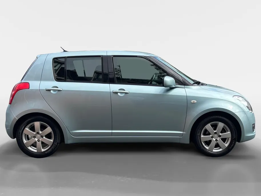Suzuki Swift 1.3 Shogun | Trekhaak | Airco | 12 maanden garantie | Lichtmetalen velgen | Radio/CD Speler