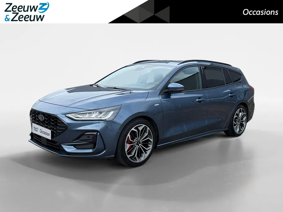Ford Focus Wagon 1.0 EcoBoost Hybrid ST Line X | NL auto | 1e eigenaar | Dealer onderhouden | Adapt cruise control | BLIS | Winter pack | Elektr. achterklep | Parkeersensoren voor en achter | Achteruitrijcamera | Apple carplay & android auto | 18' lichtmetalen velge