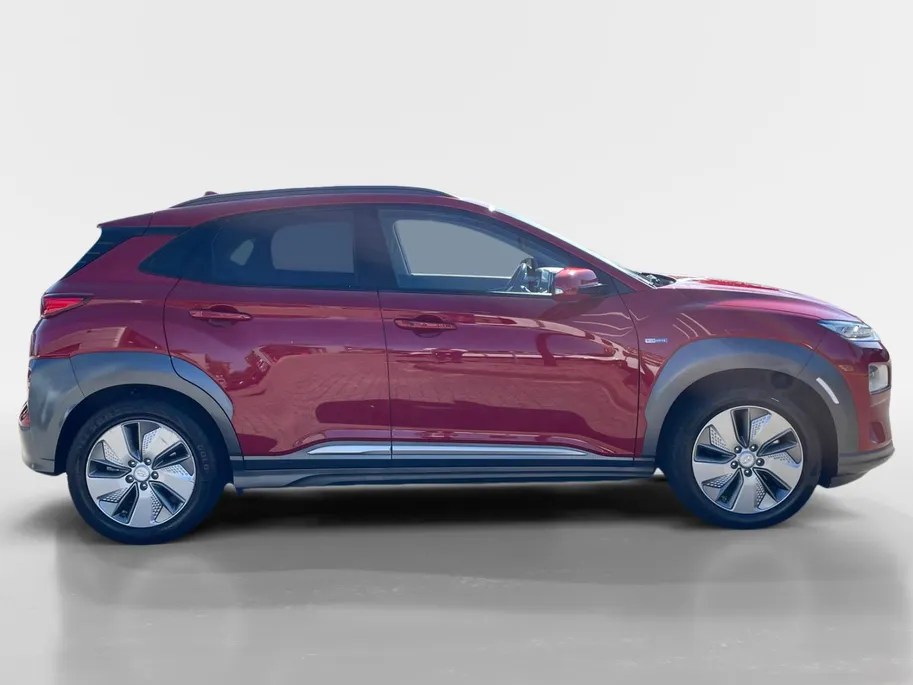 Hyundai Kona EV Premium 64 kWh | LAGE KM STAND! | Leder | Stoel- stuurverwarming | Navi