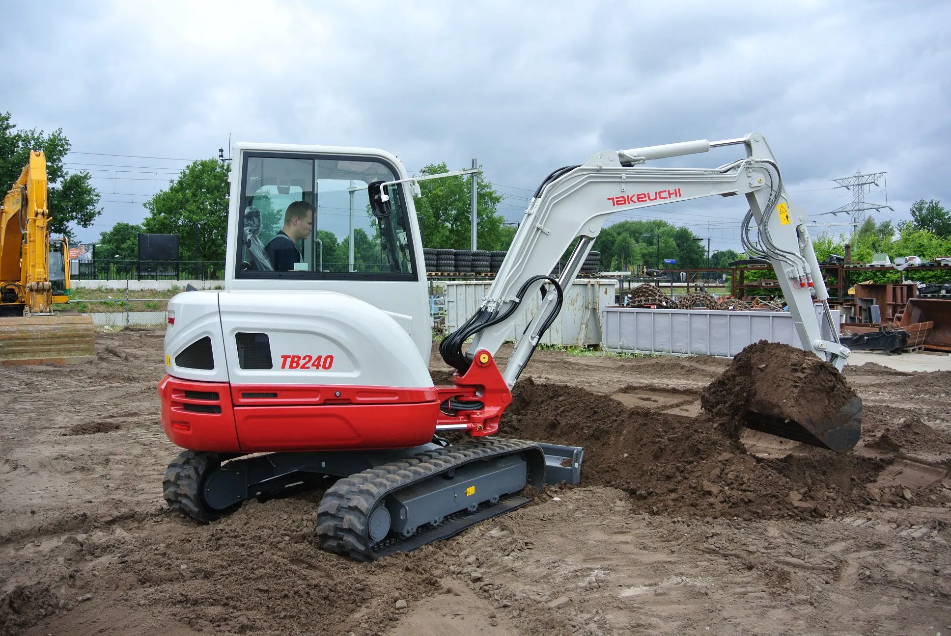 Takeuchi TB240 avec godet
