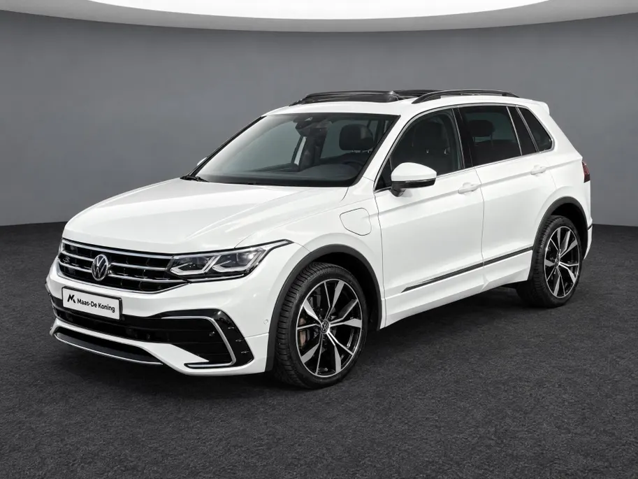 Volkswagen Tiguan 1.4 TSI 245pk DSG eHybrid R-Line Business+ · Panoramadak · Camera · Wegklapbare Trekhaak · Apple/Android Car Play · 20'' Inch · Dodehoeksensor · Stoelverwarming ·