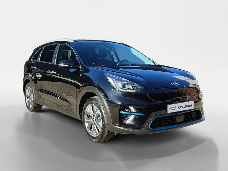Kia e-Niro DynamicPlusLine 64 kWh | Warmtepomp! | Apple Carplay / Android Auto | Navigatiesyteem | Elektrisch Verstelbare Voorstoelen | Bestuurdersstoel + Geheugen | Stoelverwarming + Stoelkoeling | Stuurverwarming | Elektrisch Schuif / Kanteldak | Licht + Regensens