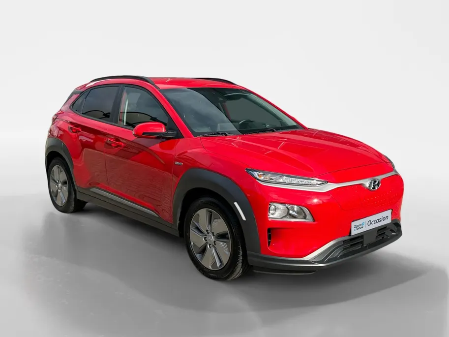 Hyundai Kona EV Fashion 64 kWh 204PK | Warmtepomp | SOH 100 % | Navigatie | Apple Carplay & Android Auto | Adaptive cruise control | Climate control | Head-up display | Parkeersensoren achter | Trekhaak |