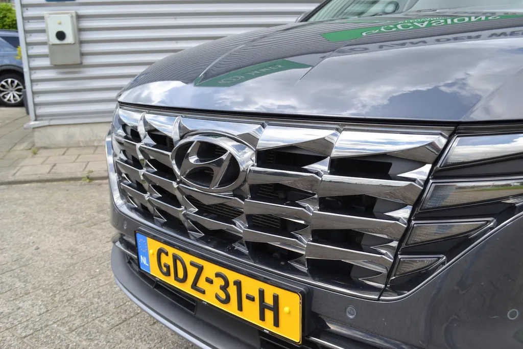 Hyundai Tucson 1.6 HEV PREMIUM|LEER|NAVI|1650KG TREKGEWICHT