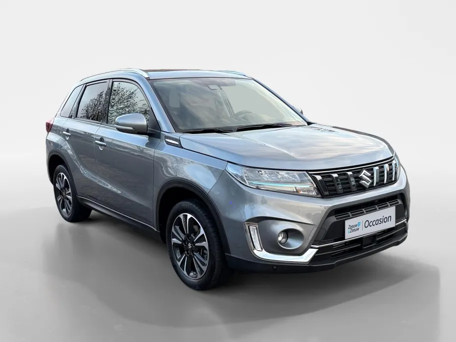 Suzuki Vitara 1.4 Boosterjet Style Smart Hybrid | Trekhaak | Dealer onderhouden | Navigatie | dodehoek detectie | Achteruitrijcamera | Stoelverwarming |10 jaar garantie! |