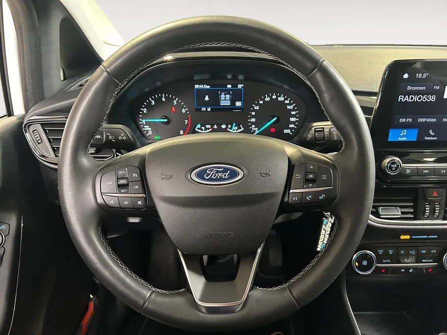Ford Fiesta 1.0 EcoBoost Hybrid Titanium | Apple Carplay / Android Auto | Stoel + Stuurverwarming | Cruise Control | Parkeersensoren Achter | Lichtsensor | Climate Control | Verwarmbare Voorruit