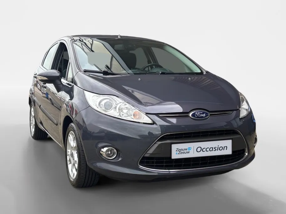 Ford Fiesta 1.4 Titanium | Voorruitverwarming | PDC | Airco | 12 maanden BOVAG garantie