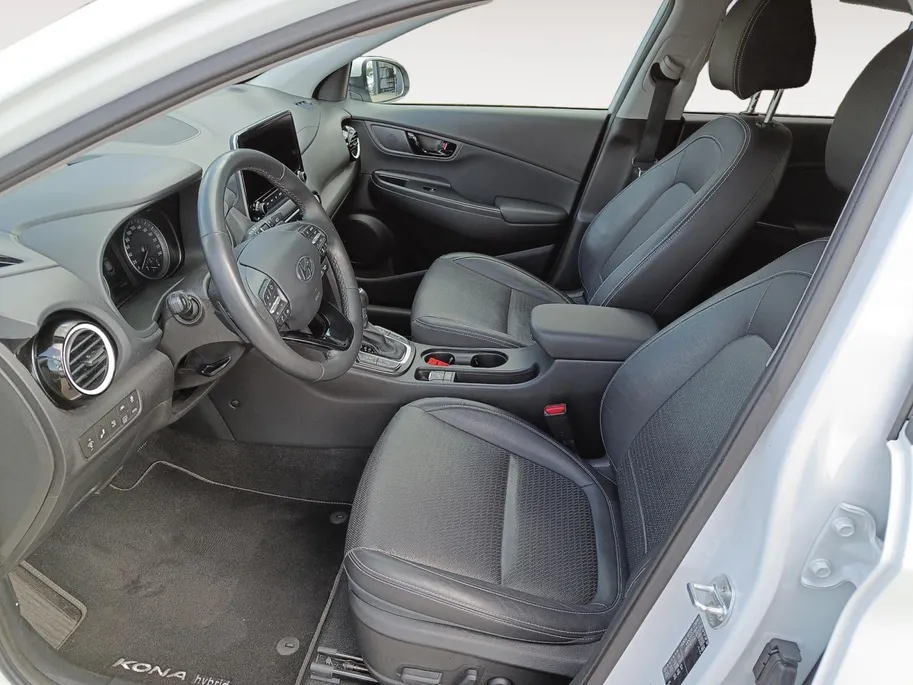 Hyundai Kona 1.6 GDI HEV Premium | Trekhaak | Apple Carplay/Android Auto | Adaptive cruise control | Dodenhoek herkenning | Leren bekleding