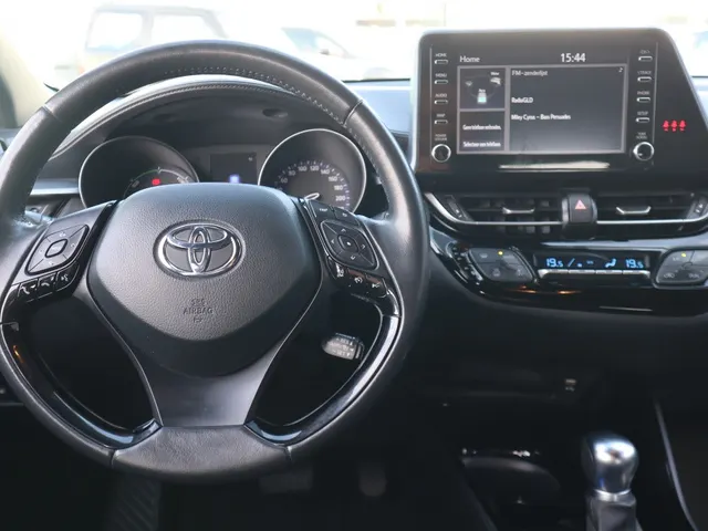 Toyota C-HR 1.8 Hybrid Style Bi-tone | Stuur en stoelverwarming | Blindspot | Trekhaak