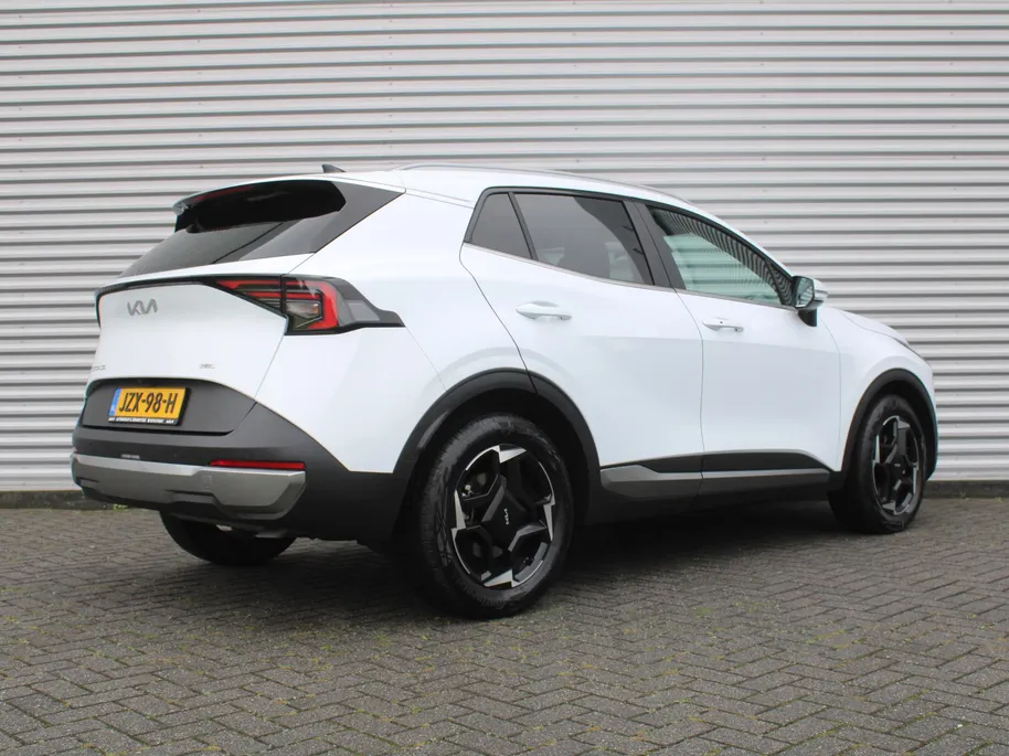 Kia Sportage 1.6 T-GDi Hybrid DynamicLine | Stuur-/stoelverwarming | Camera | Elek. stoelverstelling | Cruise adapt. | LED |  Telefoonlader | 18' LM | Clima |