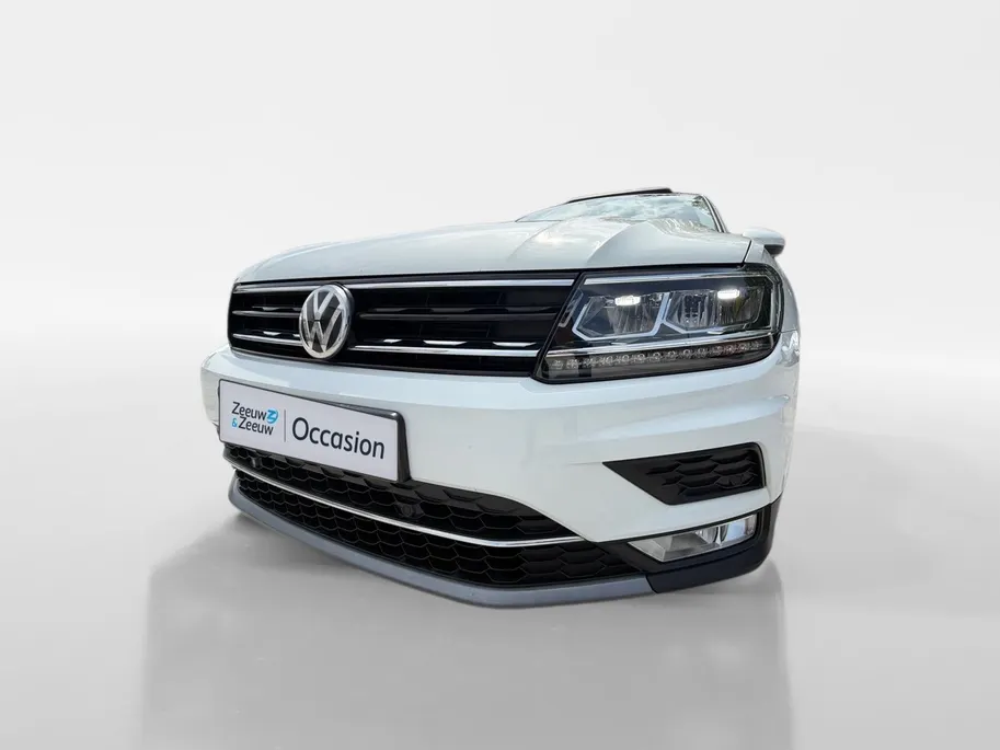 Volkswagen Tiguan 2.0 TSI 4Motion Highline | PAN. DAK | ELEKTR. TREKHAAK | STOELVERWARMING | NL-AUTO | DEALERONDERHOUDEN | ETC..