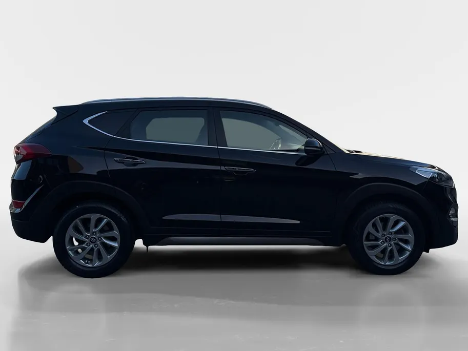 Hyundai Tucson 1.6 GDi Comfort | Elektrisch Verstelbare Stoelen | Navigatie | Bluetooth | Camera | Stoelverwarming | Cruise & Climate Control | Onderhoudshistorie | All Season Banden | 12 Maanden BOVAG Garantie
