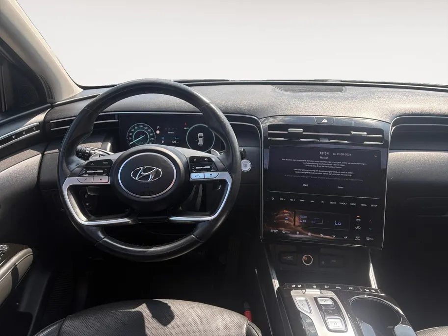 Hyundai Tucson 1.6 T-GDI PHEV Premium Sky 4WD | Schuif- kanteldak | Stoelverwarming | Stoelverkoeling | Leder