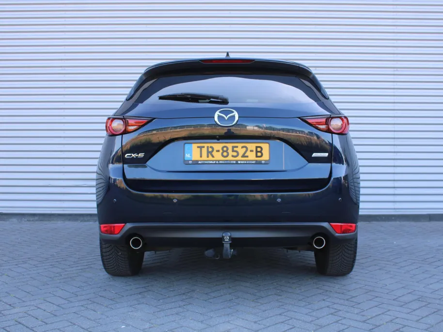 Mazda CX-5 2.0 SkyActiv-G 165 Skylease Luxury | Trekhaak | 360 Camera | Leer | Stuur-/stoelverwarming | HUD | Bose | Elek. stoelverstelling | 19' LM | All seasons |