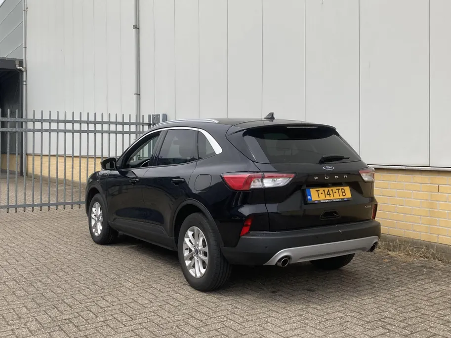 Ford Kuga 2.5 PHEV 225 pk Titanium Winter Pack - Draadloos opladen telefoon Origineel NL auto met weinig km.
