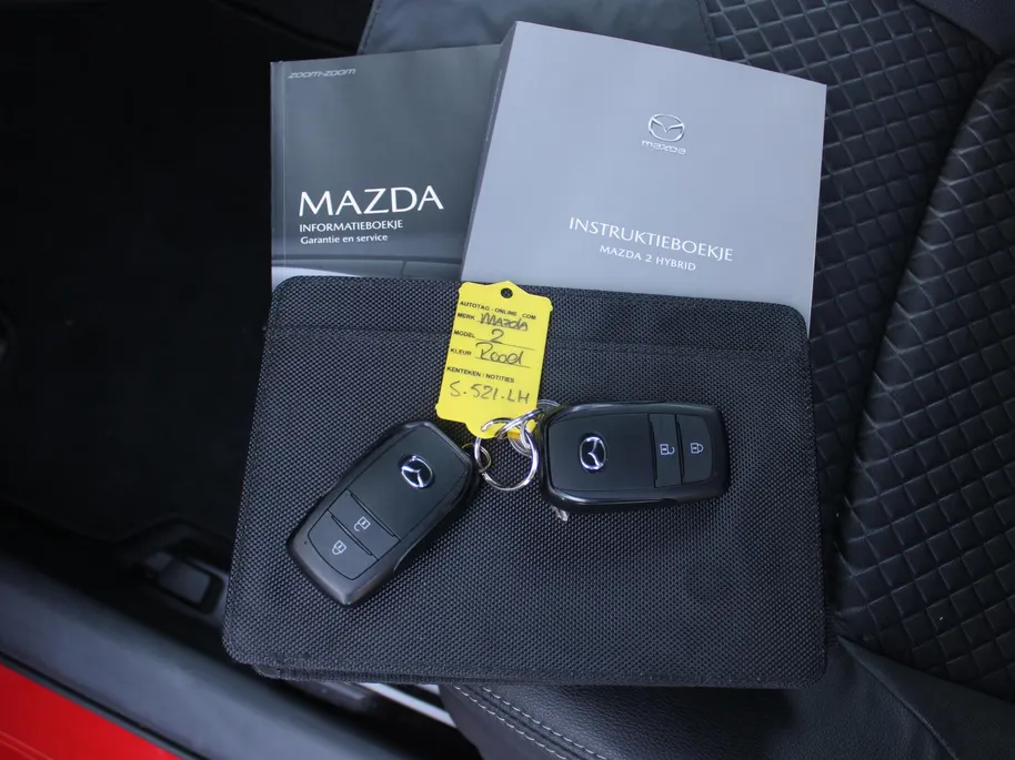 Mazda 2 Hybrid 1.5 Select | Trekhaak | Stuur-/stoelverwarming | Camera | HUD | Telefoonlader | Dodehoek detectie | Cruise adapt. | Clima | 16' LM |