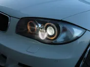 BMW 1 Serie Cabrio 118i Executive | M-Pakket | Stoelverwarming | 17' LM | Windscherm | Parkeersensor v+a | Trekhaak | Navi | Leer | Xenon | Clima |