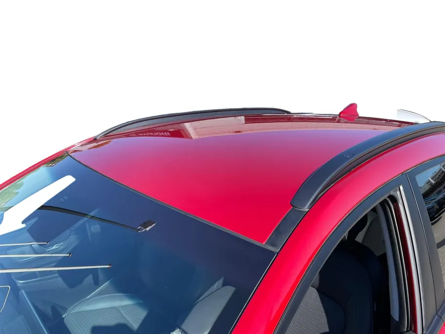 Hyundai Kona EV Premium 64 kWh | LAGE KM STAND! | Leder | Stoel- stuurverwarming | Navi