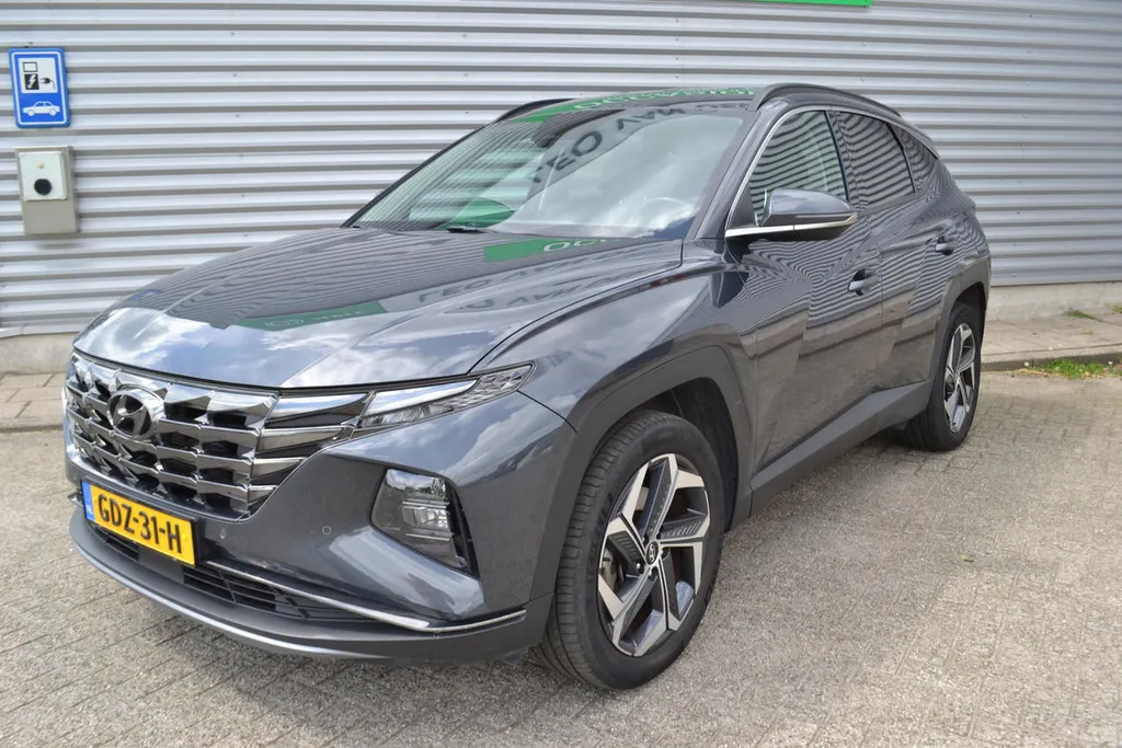 Hyundai Tucson 1.6 HEV PREMIUM|LEER|NAVI|1650KG TREKGEWICHT