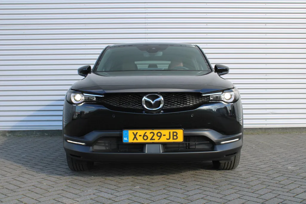 Mazda MX-30 e-SkyActiv R-EV 170 Advantage Industrial | Stoelverwarming | HUD | Dodehoek detectie | Elek. stoelverstelling | LED | 18' LM | Camera |