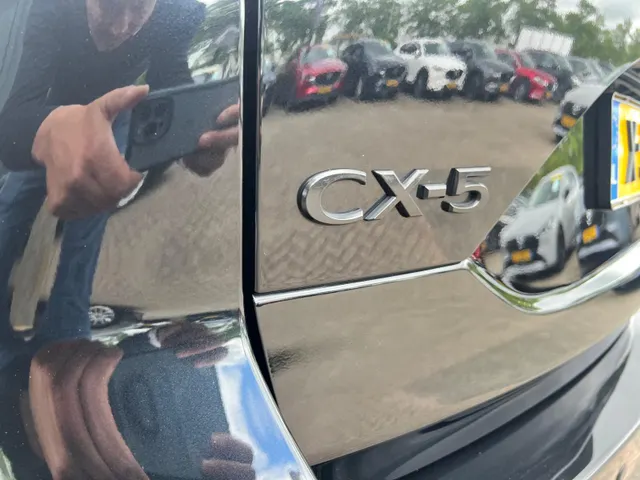 Mazda CX-5 2.0 SkyActiv-G 165 Homura AUTOMAAT | TREKHAAK | 360gr CAMERA | APPLE CARPLAY/ANDROID AUTO | HEAD-UP DISPLAY | STOEL- en STUURVERWARMING | NAVIGATIE |