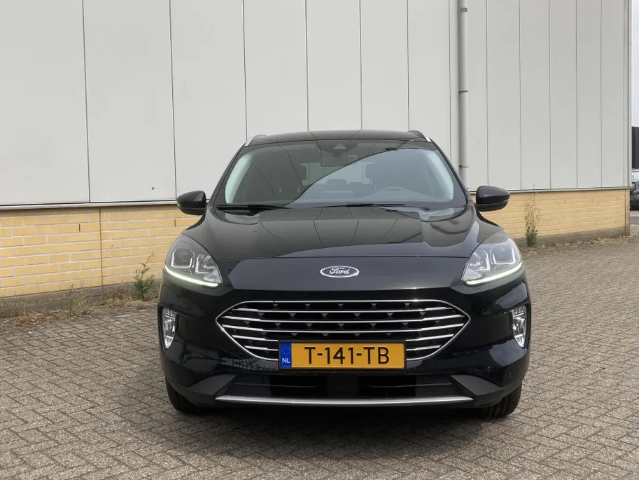 Ford Kuga 2.5 PHEV 225 pk Titanium Winter Pack - Draadloos opladen telefoon Origineel NL auto met weinig km.