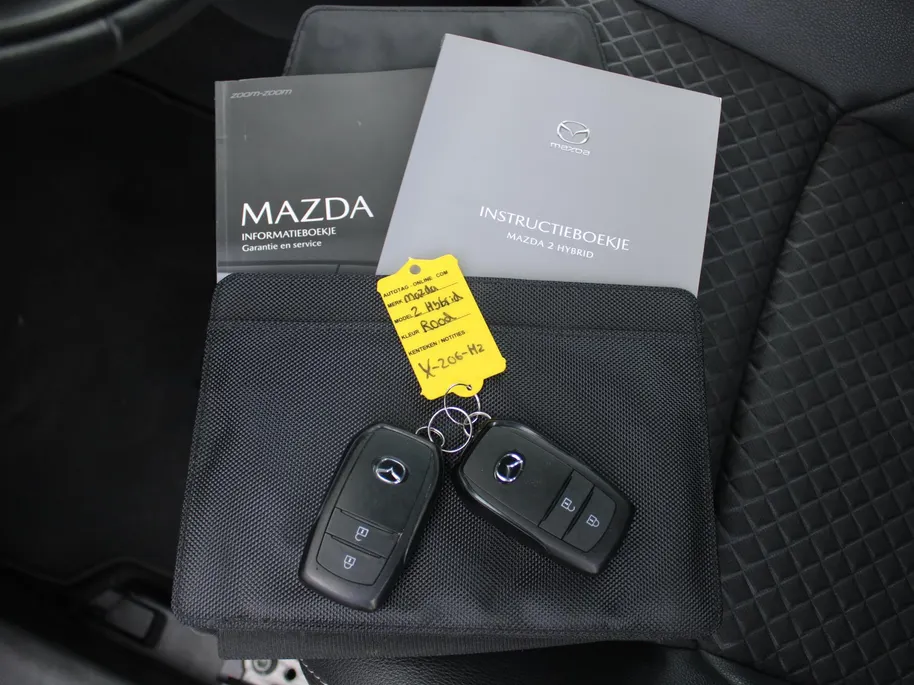 Mazda 2 Hybrid 1.5 Agile | Comfort pakket | CarPlay | Camera | Stuur-/stoelverwarming | Cruise adapt. | 15' LM |