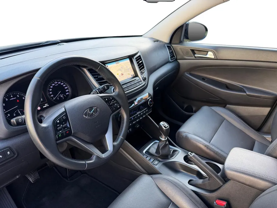 Hyundai Tucson 1.6 GDi Comfort | Elektrisch Verstelbare Stoelen | Navigatie | Bluetooth | Camera | Stoelverwarming | Cruise & Climate Control | Onderhoudshistorie | All Season Banden | 12 Maanden BOVAG Garantie