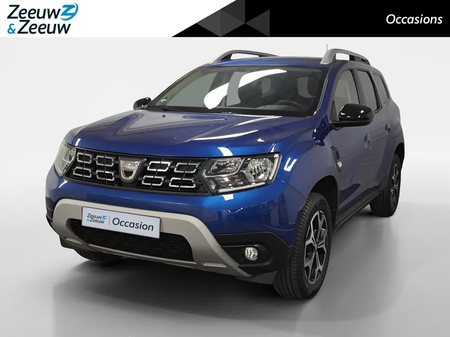 Dacia Duster 1.0 TCe Bi-Fuel Serie Limitee 15th Anniversary NAVI AIRCO CAMERA PARKEERSENSOREN CRUISE CONTROLE LM VELGEN HOGE INSTAP  ZEER MOOIE AUTO OP LPG 12 MAANDEN GARANTIE