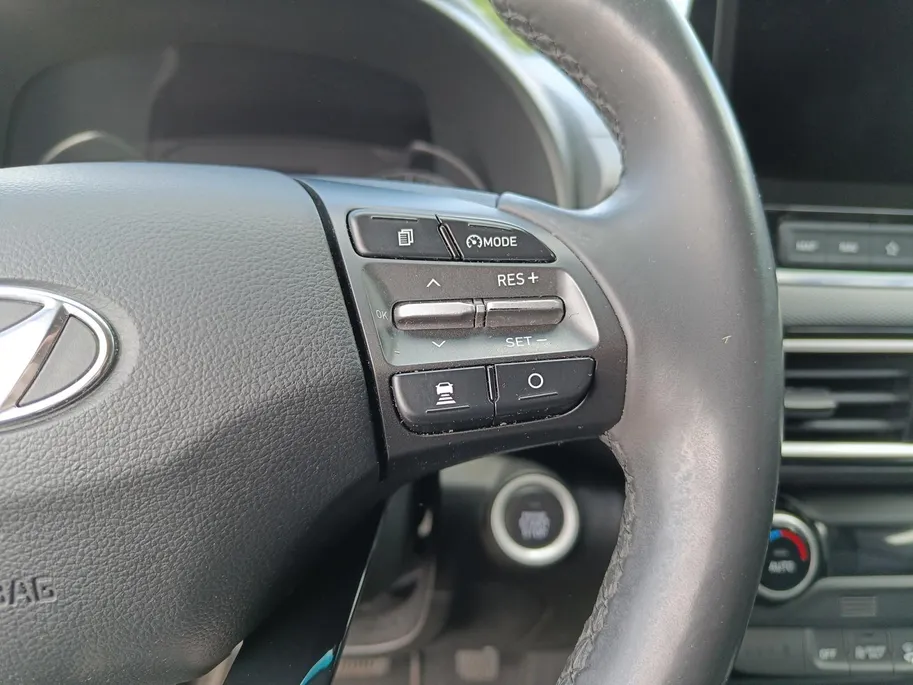 Hyundai Kona 1.6 GDI HEV Premium | Trekhaak | Apple Carplay/Android Auto | Adaptive cruise control | Dodenhoek herkenning | Leren bekleding