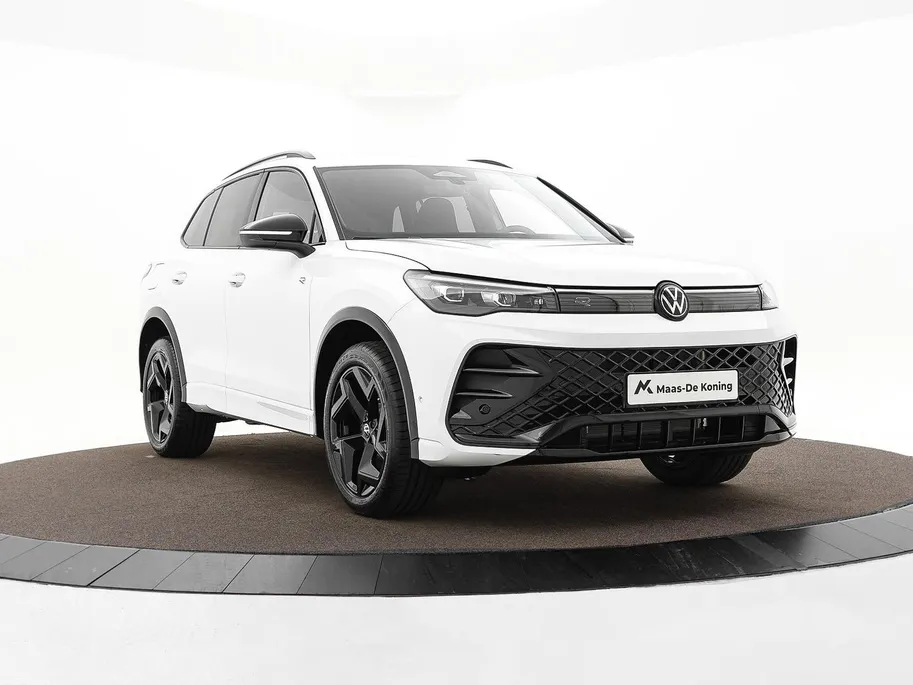 Volkswagen Tiguan R-Line 1.5 eHybrid 204 PK 6 versn. DSG · Voorstoelen verwarmbaar · Sfeerverlichting · All-season banden