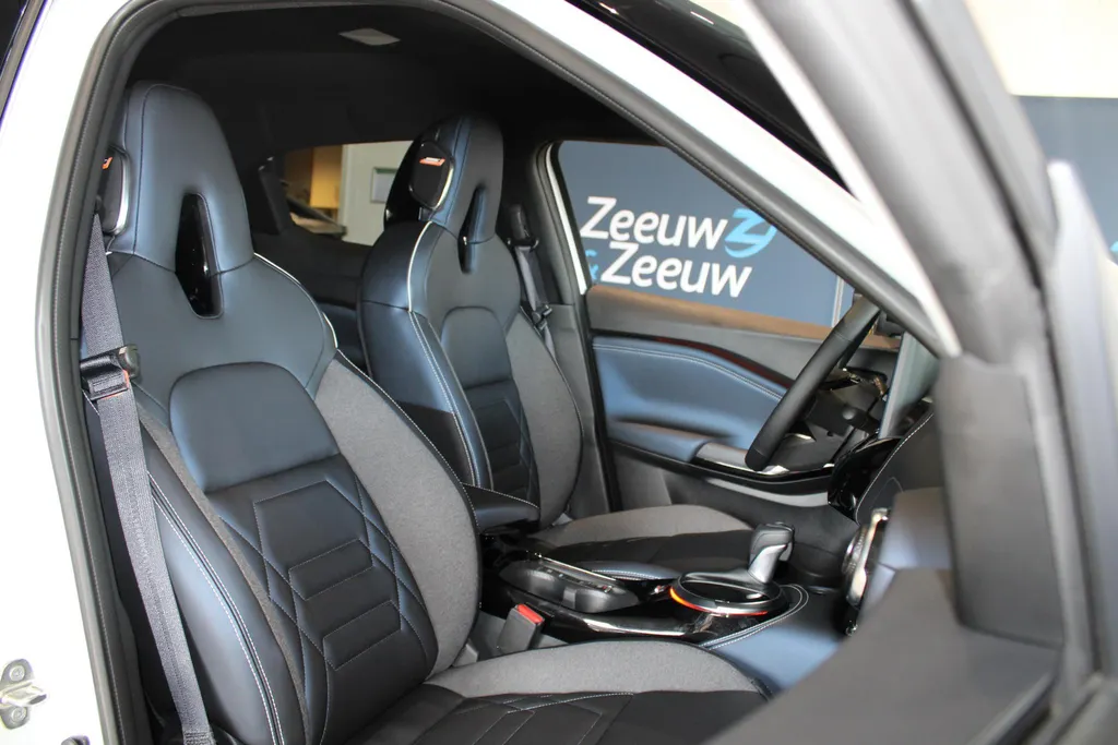 Nissan Juke 1.6 Hybrid Pulse | Bose audio | 360grd camera | Dodehoeksensoren| Lederen bekleding | Apple carplay & Androidauto | Pro-pilot | Stuur-, en Stoel- en voorruitverwarming |